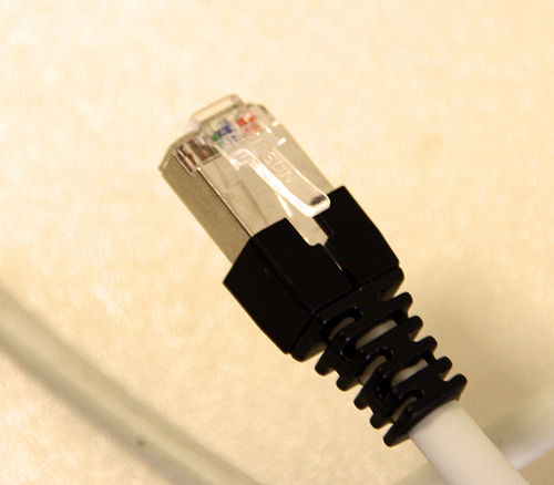 there is a white and black cord attached to a cable