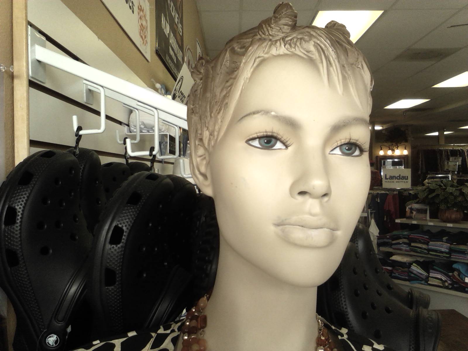 a mannequin with an animal print shirt and a cheetah pattern