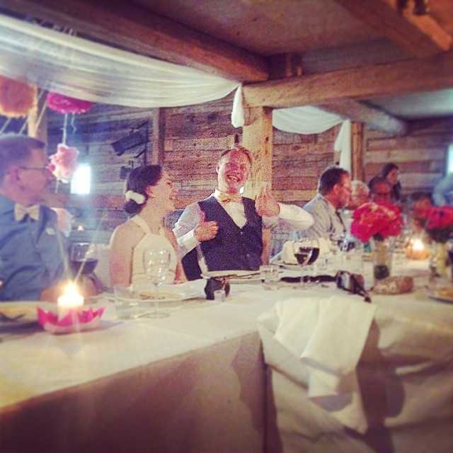 a bunch of people at a table with some wine