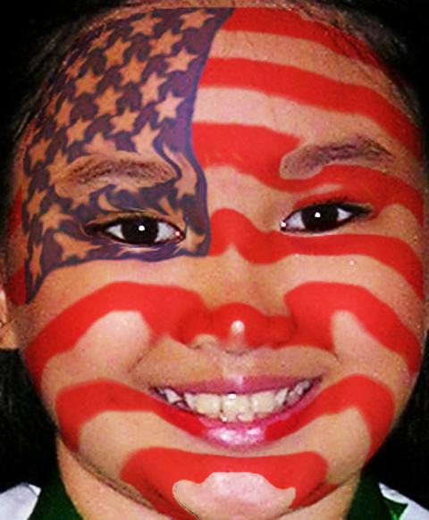 the little girl has her face painted red and white