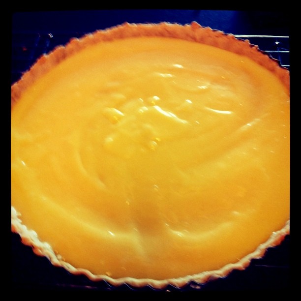 a pie crust on a cooling rack in an oven