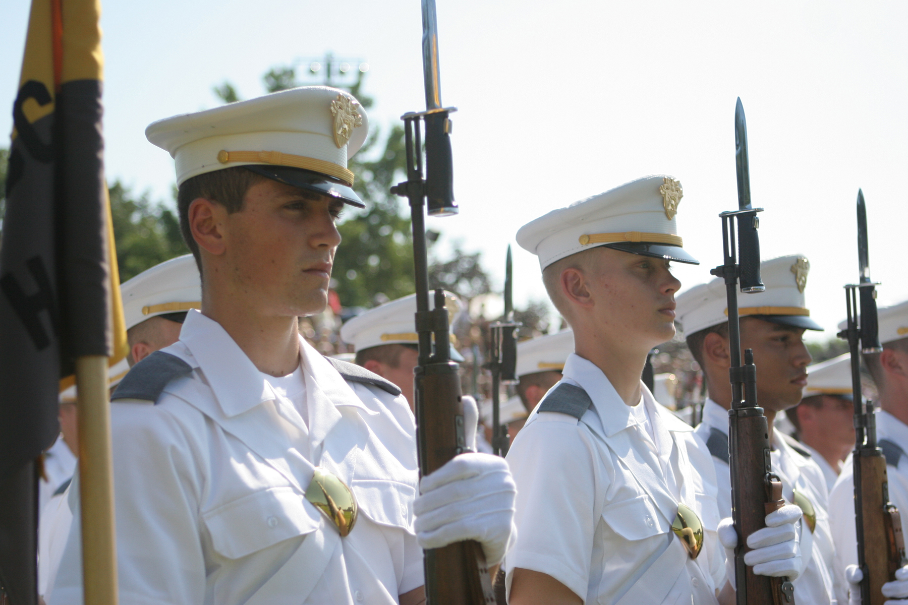 many soldiers wearing naval uniforms standing in formation