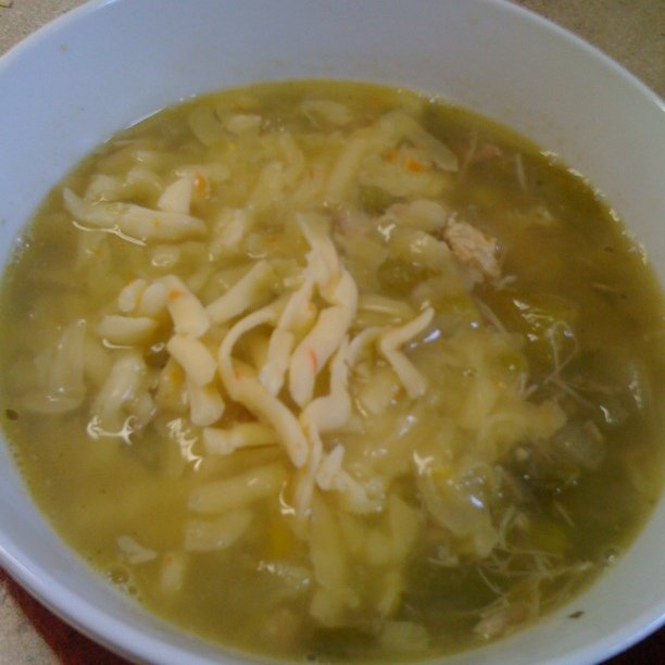 chicken noodle soup with pasta in white bowl