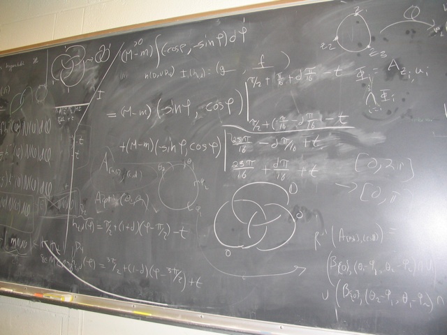 there is a large black board in the building