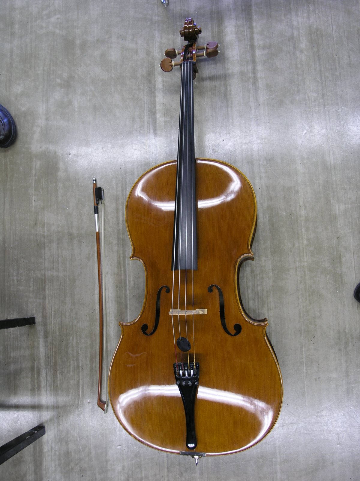 a violin with two strings and other instruments