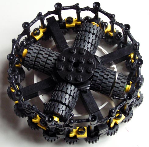 four wheels with black spokes connected by yellow springs