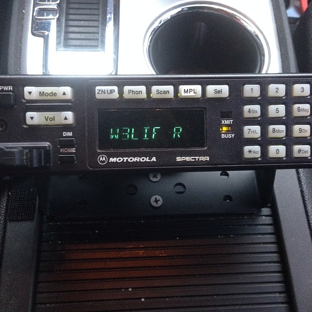 an old radio has a display displaying the time