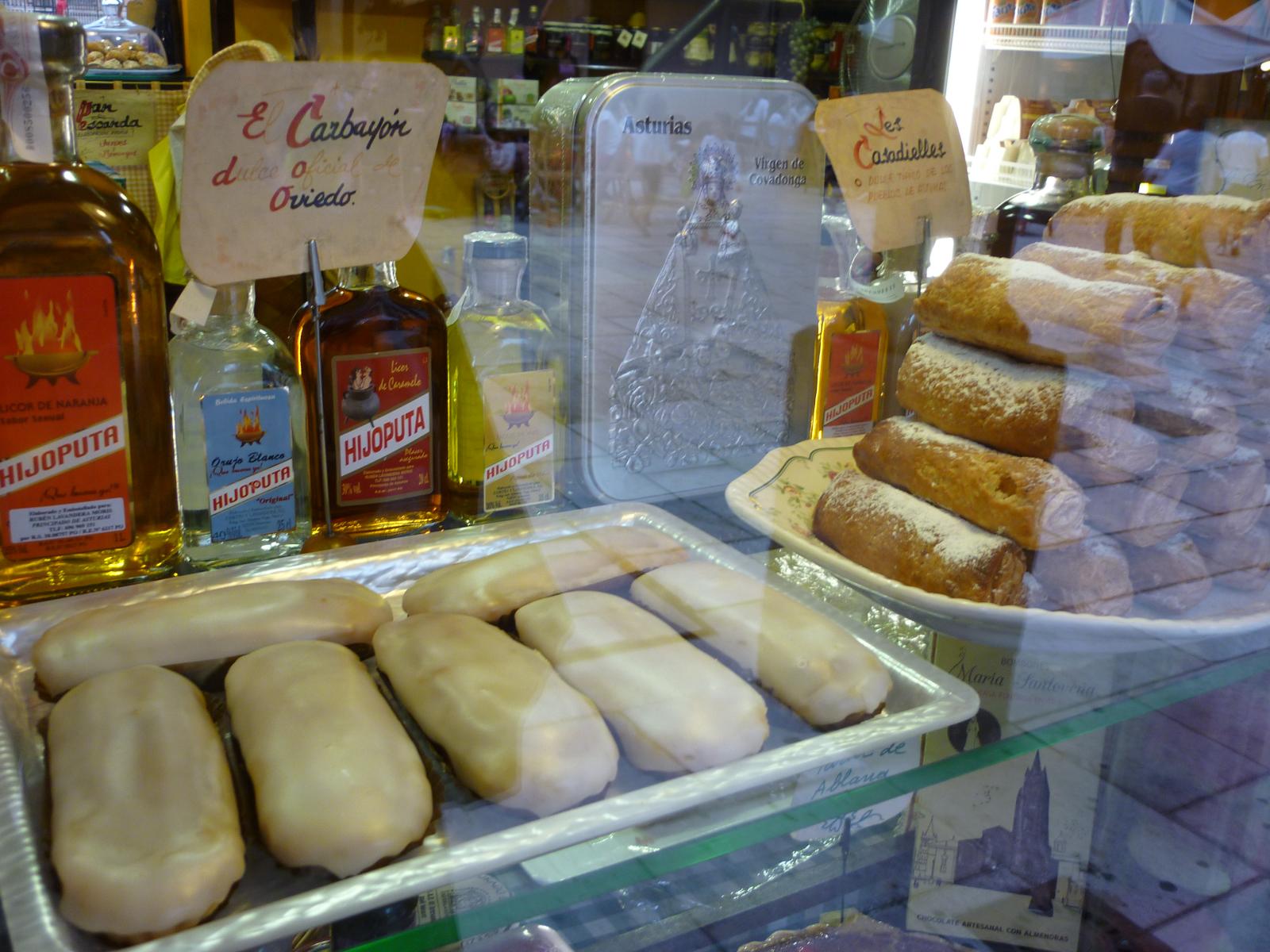 pastries in a display case behind glass