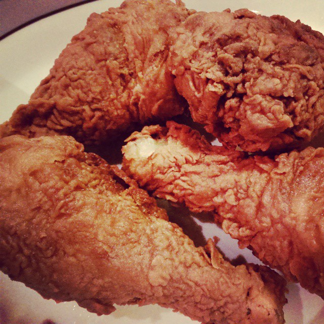 fried chicken on a white plate has been fried