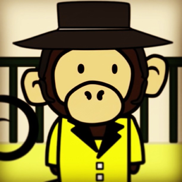 a monkey in yellow with a top hat on