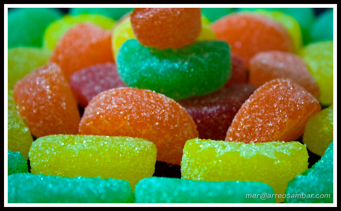 a variety of gummy bears are stacked on top of each other