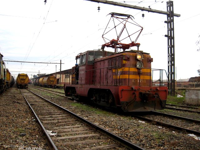 an abandoned train car is stopped on the railroad tracks