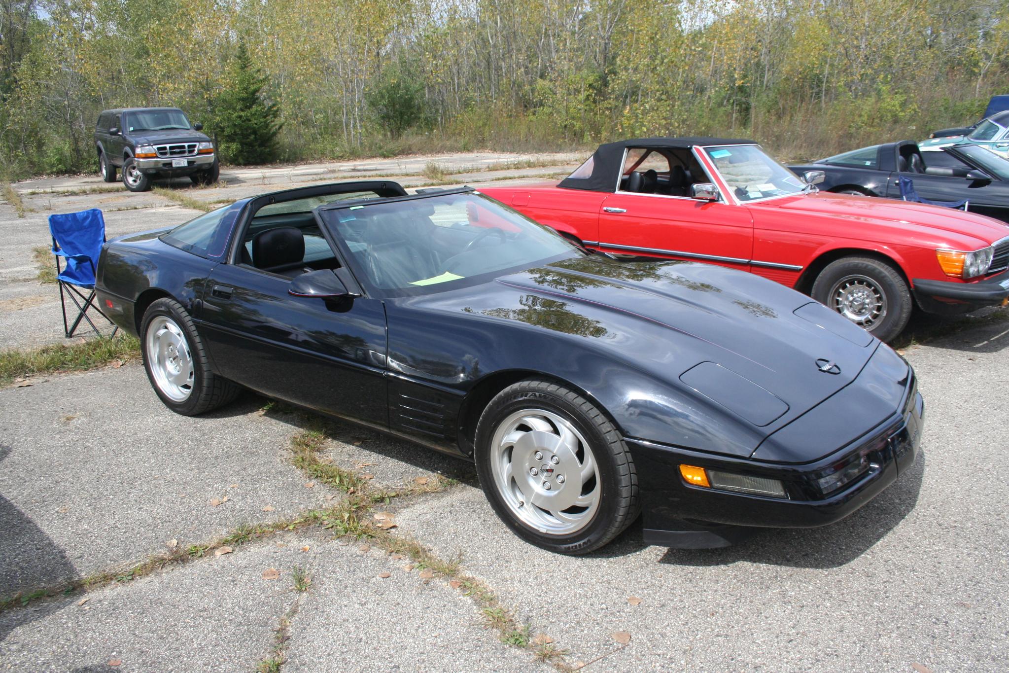 several cars are parked in a parking lot