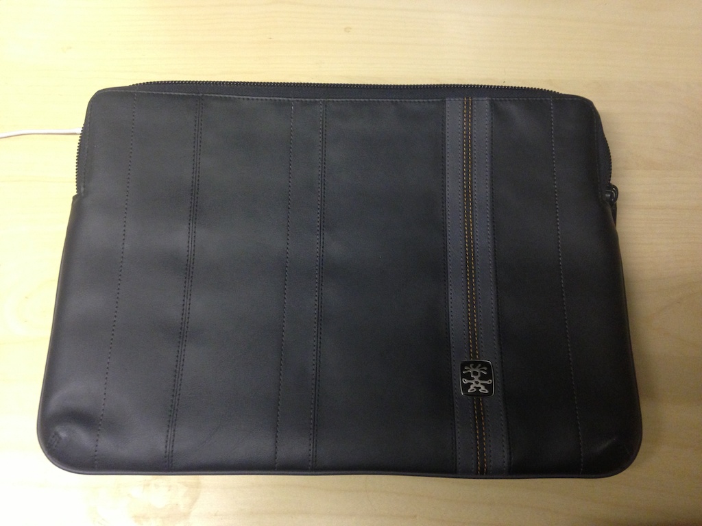 an elegant leather briefcase with ons on the inside