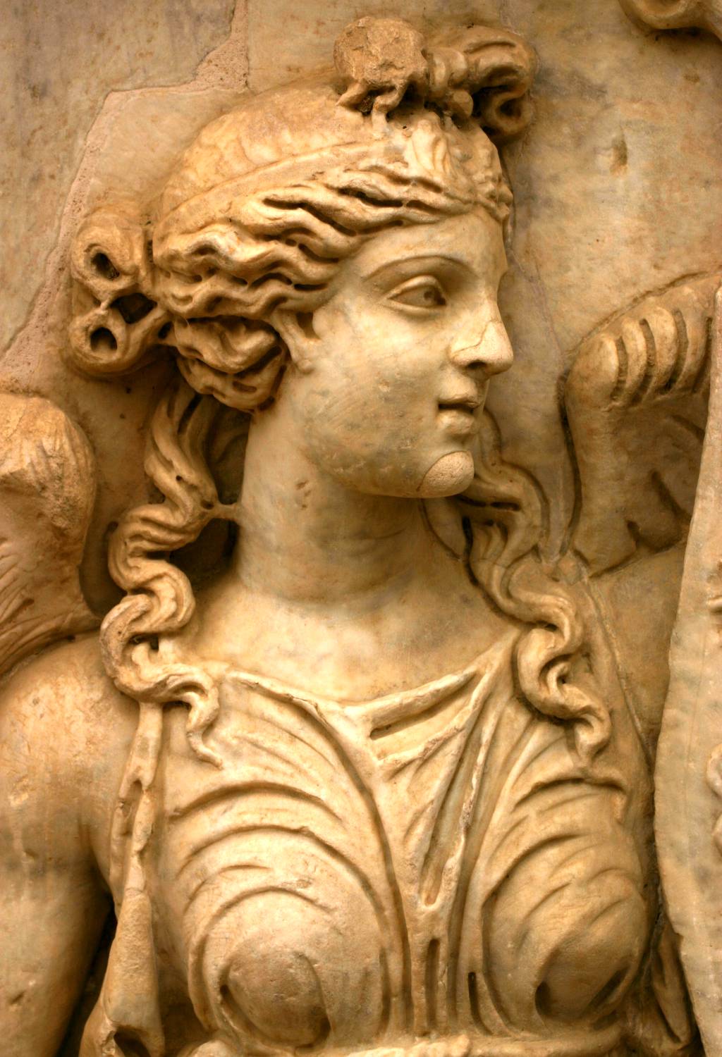 statue in ancient roman sculpture, with horns on her head