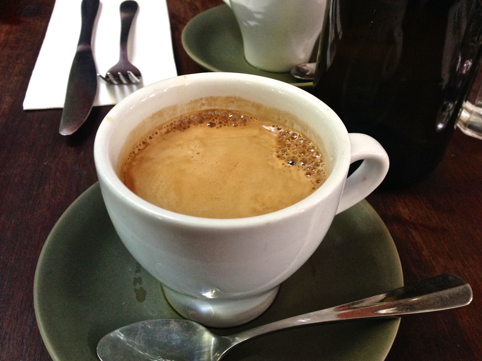 an image of a coffee cup on a plate