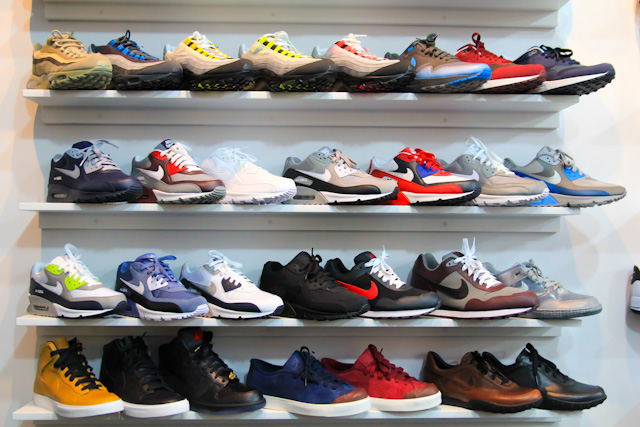 the nike sneakers on display are all lined up