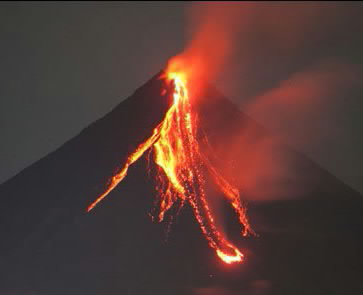 an active volcano with bright yellow and red flames
