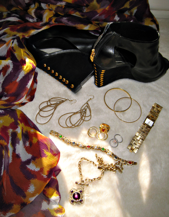 many assorted jewelry pieces on a cloth