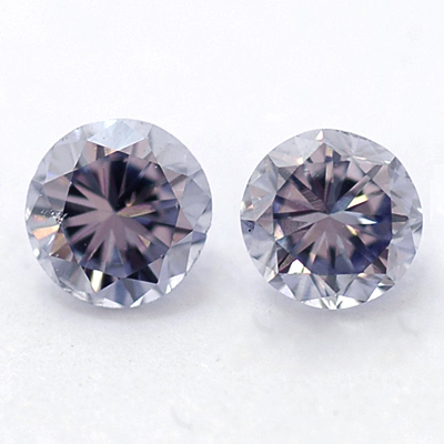 two diamonds that are very pretty with clear crystals