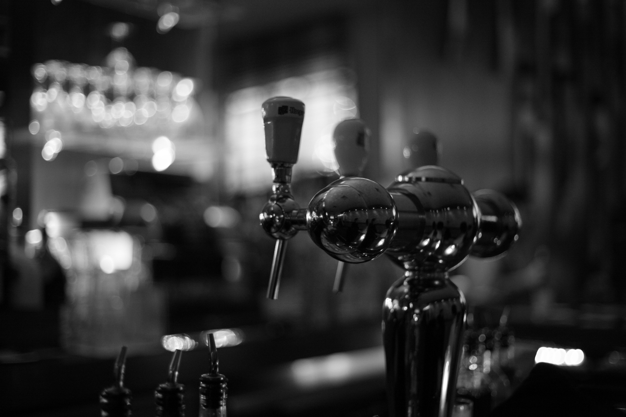 a small group of bottles on a bar