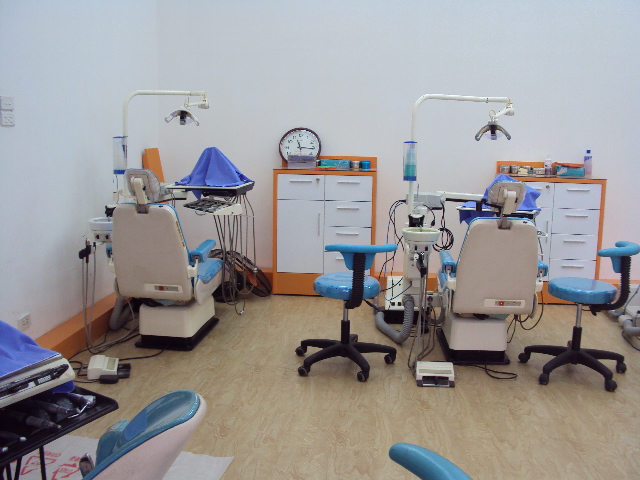the room has four chairs and three other medical equipment