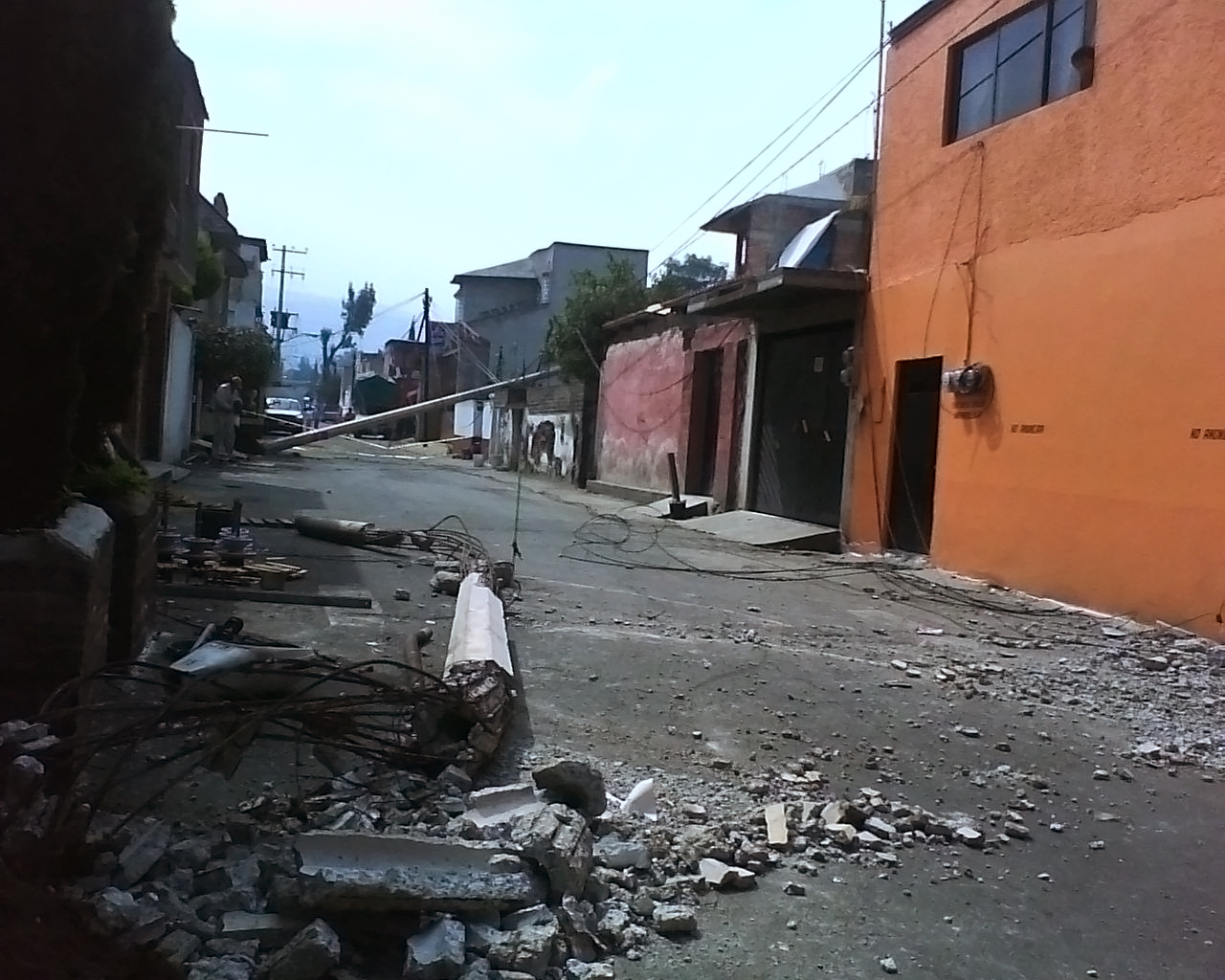 an old street with rubble and broken down buildings