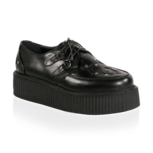 a black platform shoe with black platform shoes