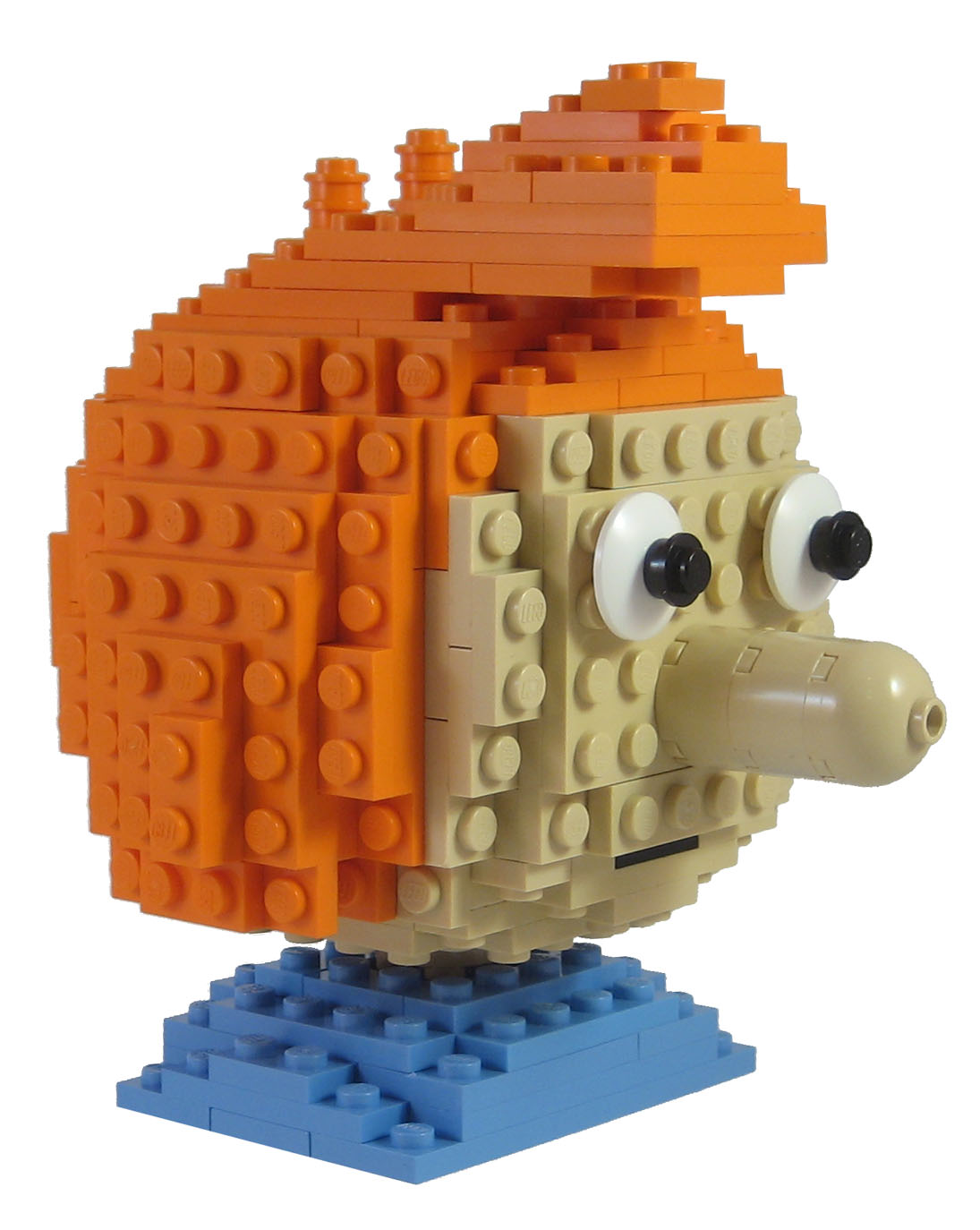 a lego fish head on top of a table