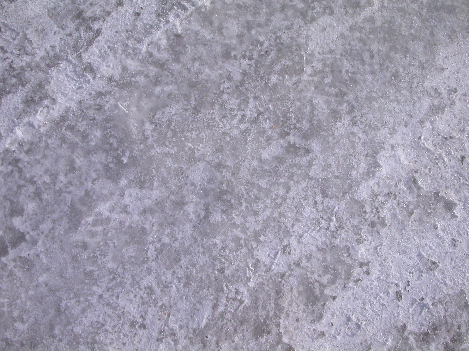 a close up image of gray and white cement