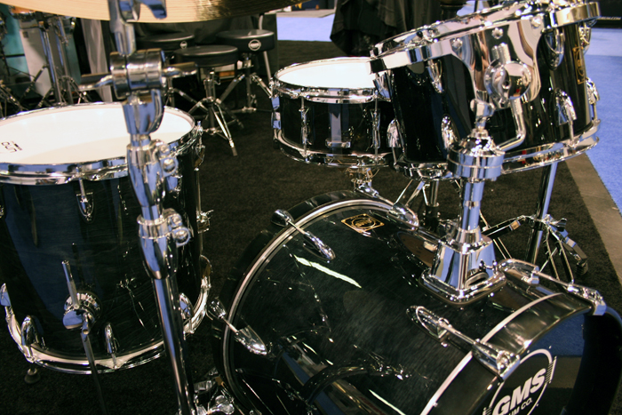 a drums on display in front of people at a show