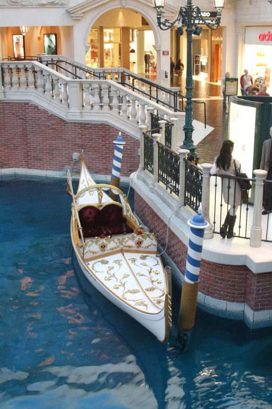 a gondola on the canal is inside a shopping mall