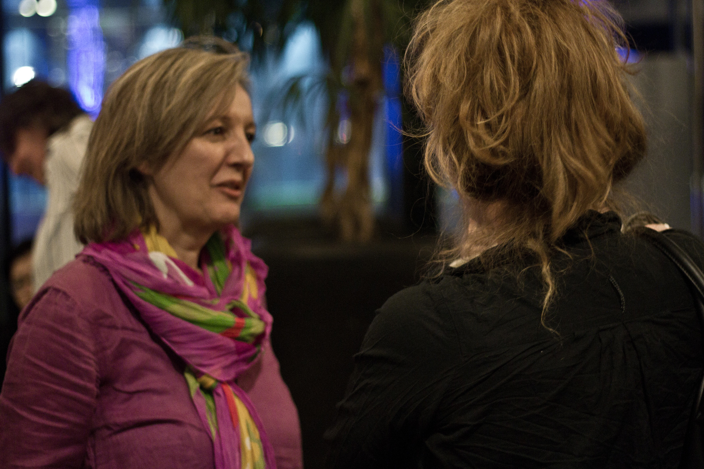 two women with one woman talking to each other