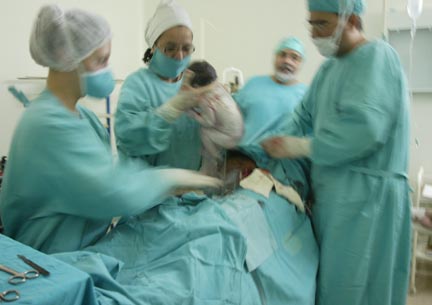 doctors preparing for  in the operating room