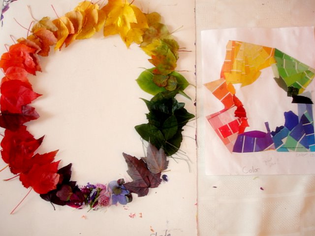 several pieces of paper cut in to shape and decorate a wreath with multicolored papers