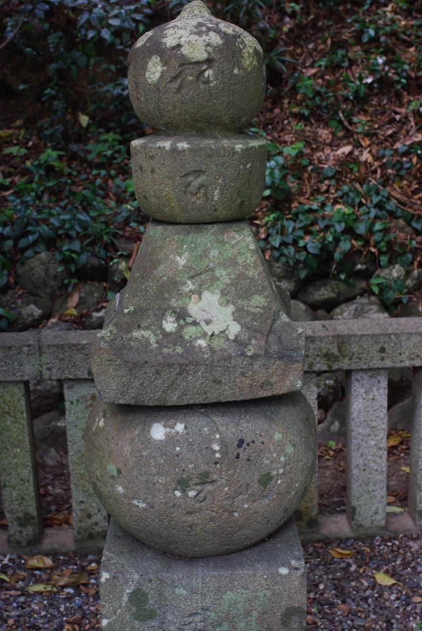 stone sculptures displayed in a garden