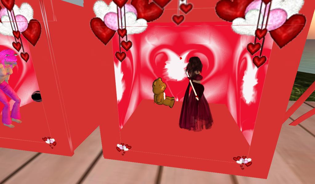 three red - colored frames of a couple in a red room with hearts hanging from the ceiling and a girl on a chair