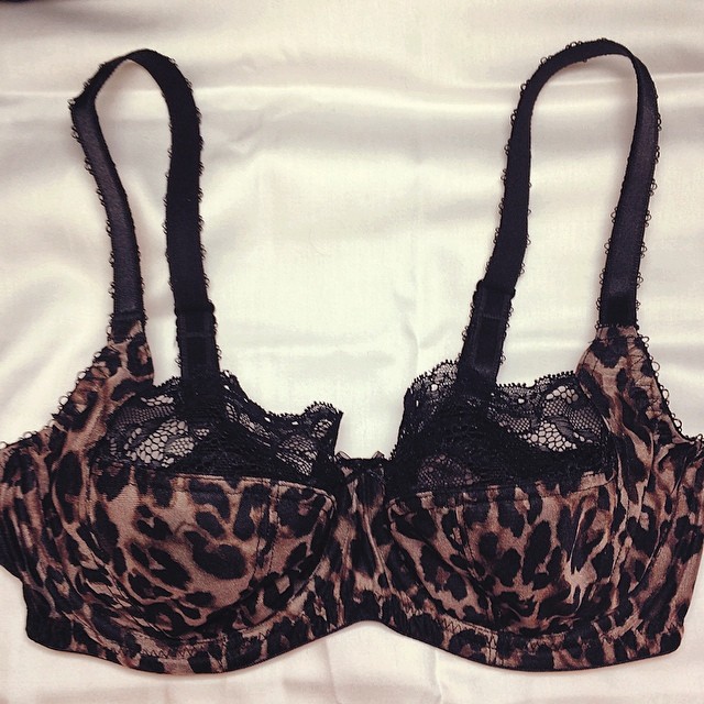 an animal print  top with black lace
