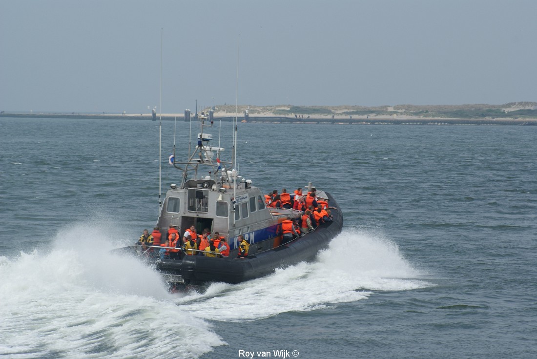 a boat with people inside on the water