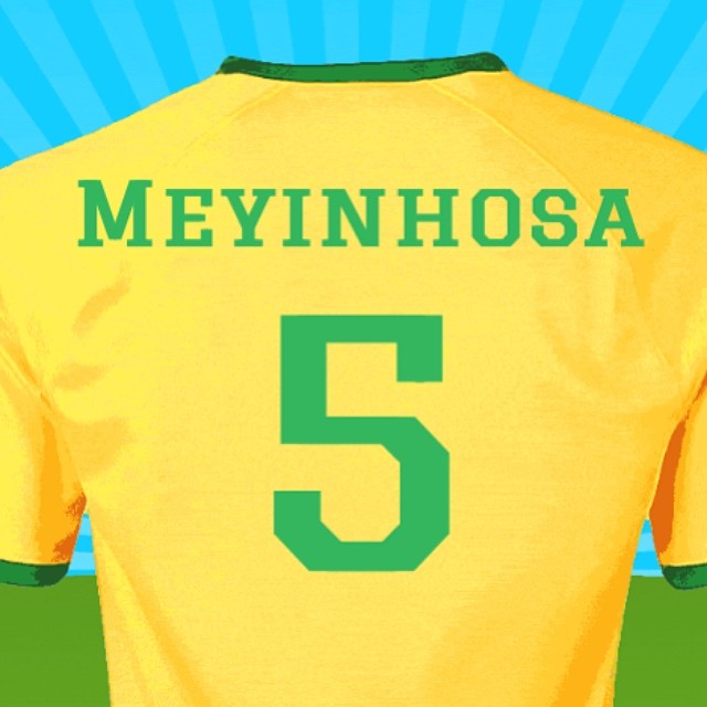 a yellow soccer jersey with the number five printed on it