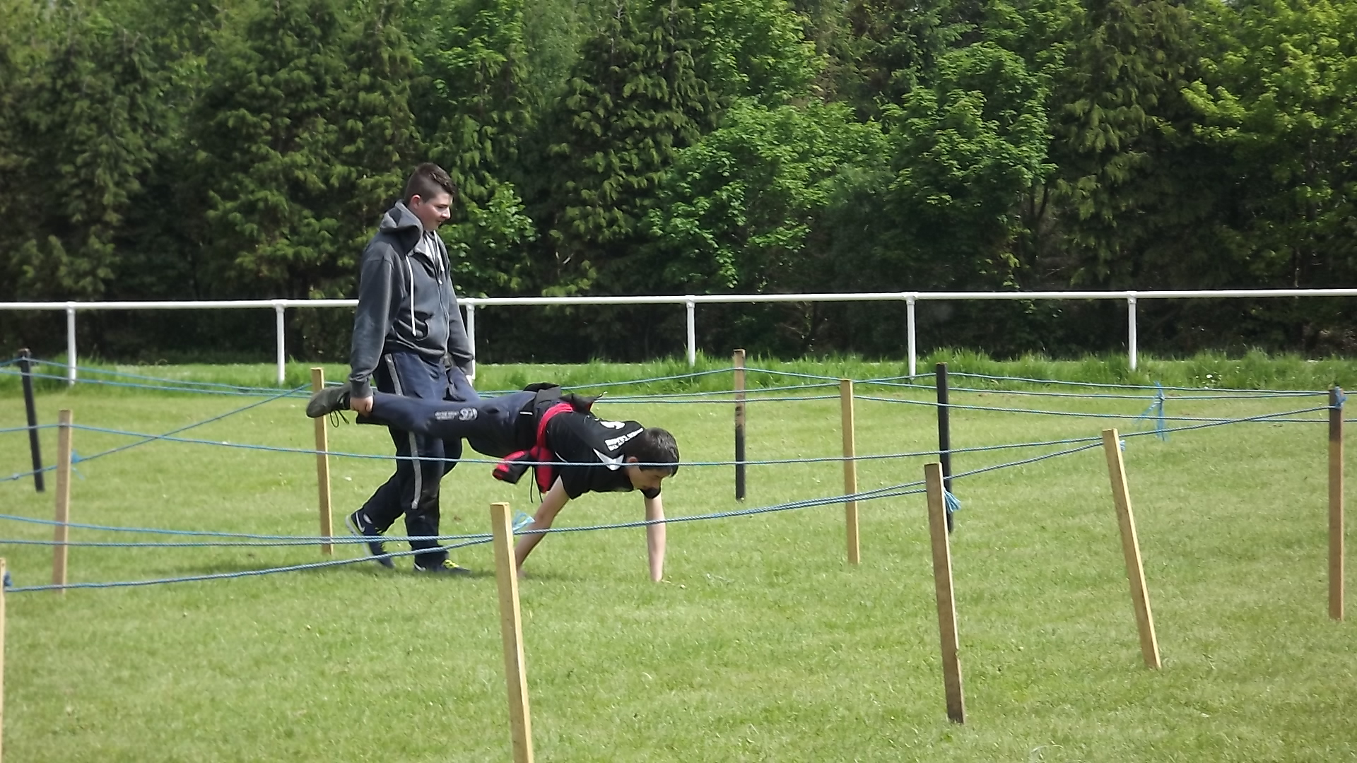 a man on a horse with the dog hanging out