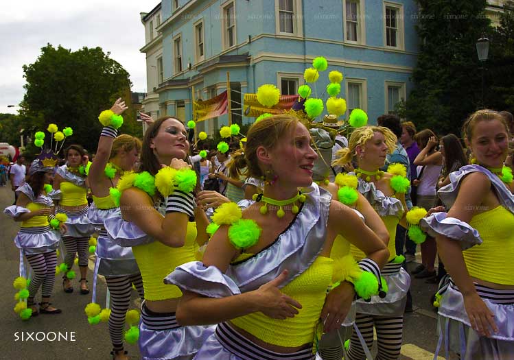 the colorful costumes of people are performing a dance