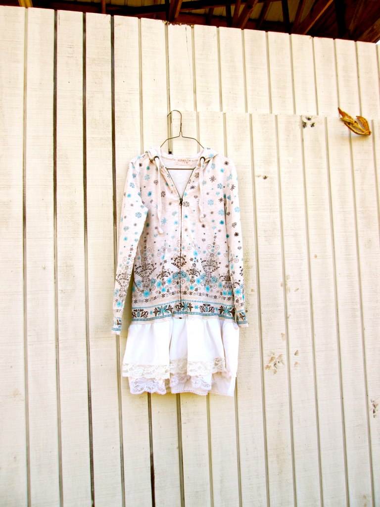 a picture of a clothes rack in front of a wall