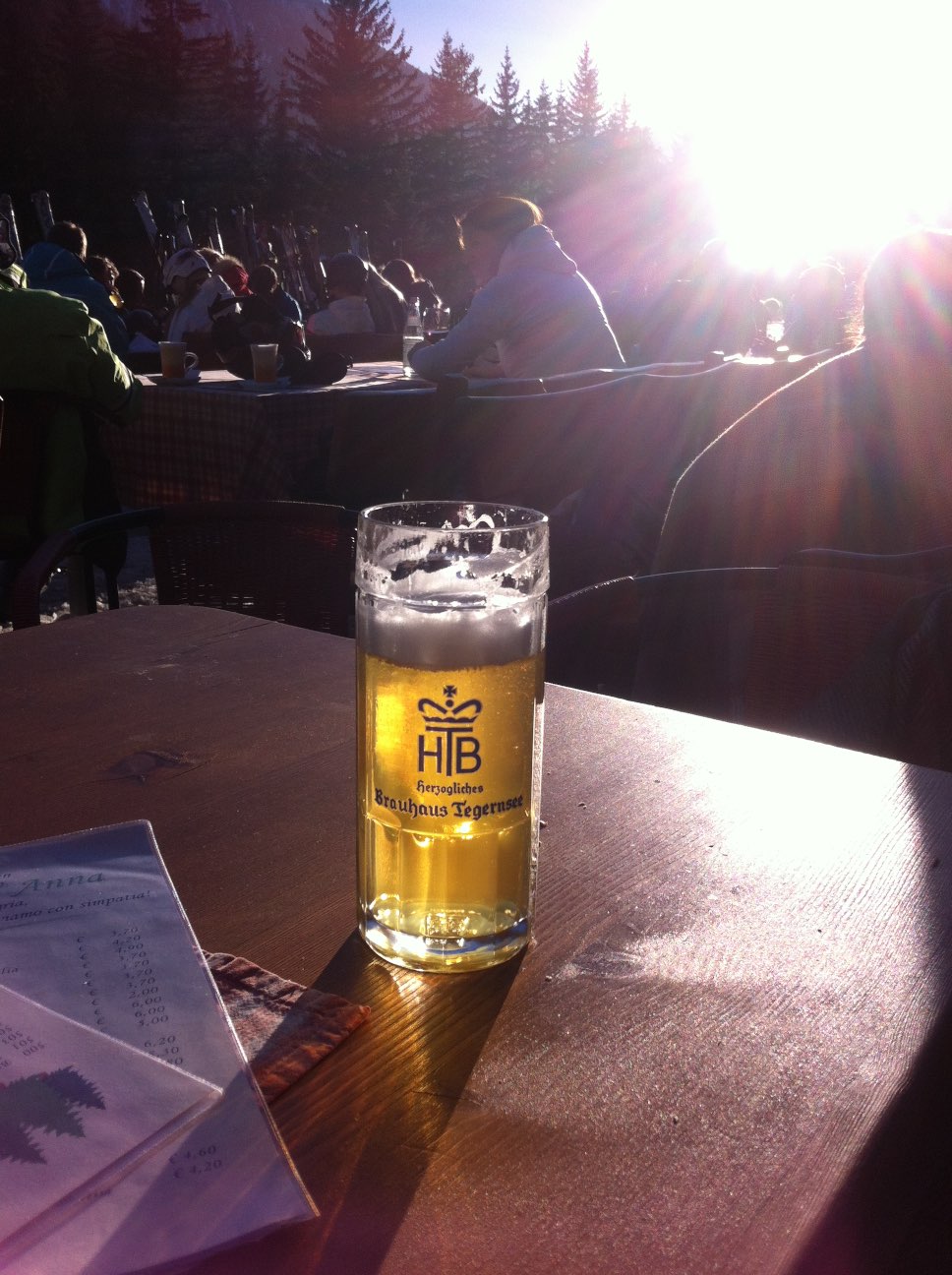 a beer glass on a table in a restaurant