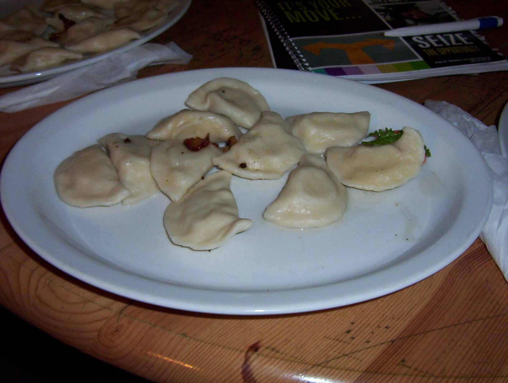 dumplings of food are on a white plate