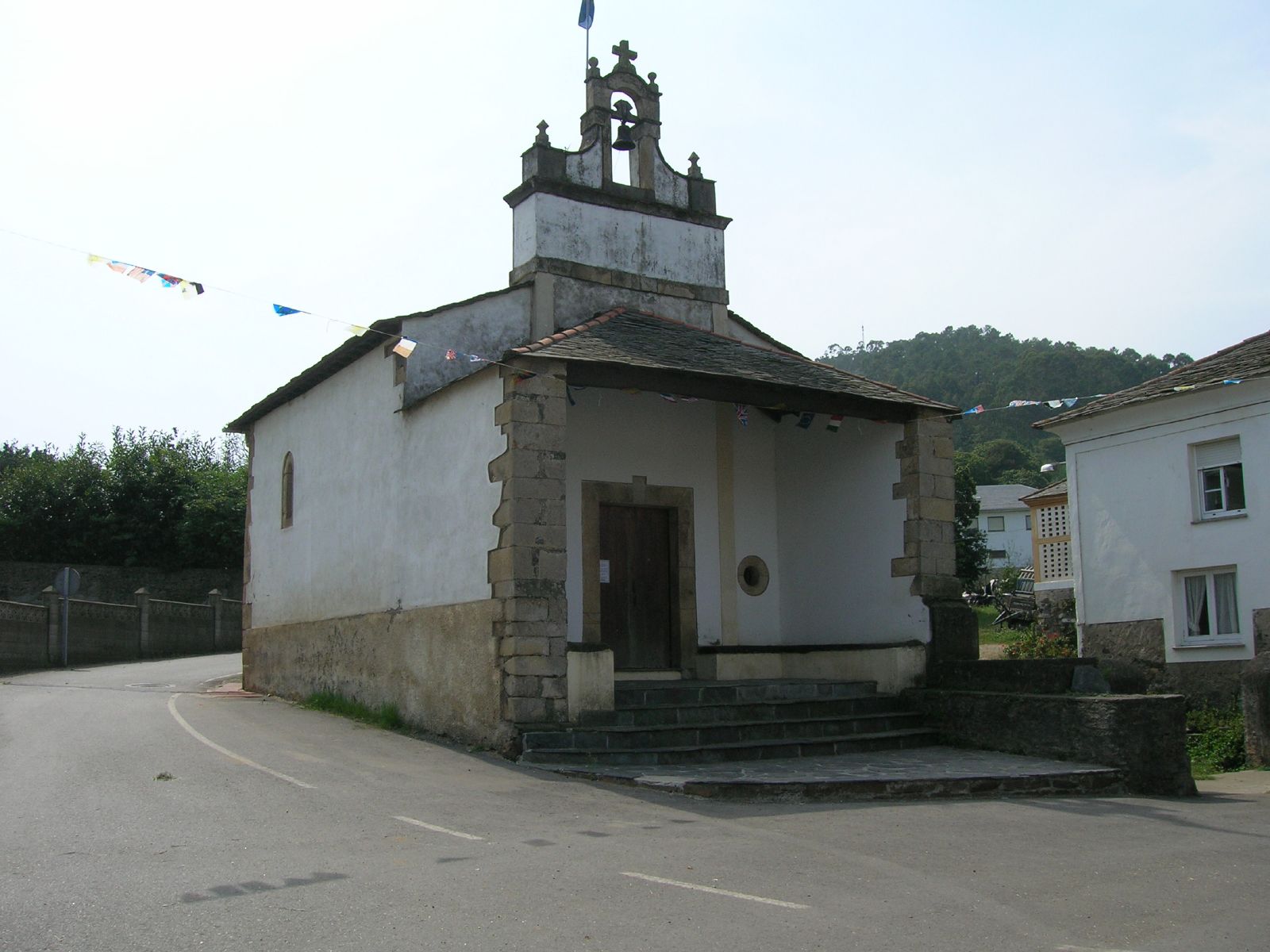 an old church with a steeple and a bell tower