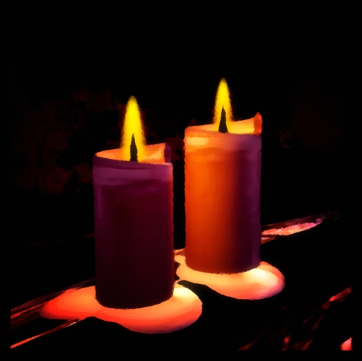 three lighted candles are on a table