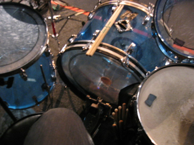 a close up po of some drums sitting next to each other