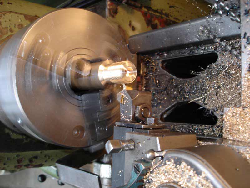 the center of an automated lathe milling machine