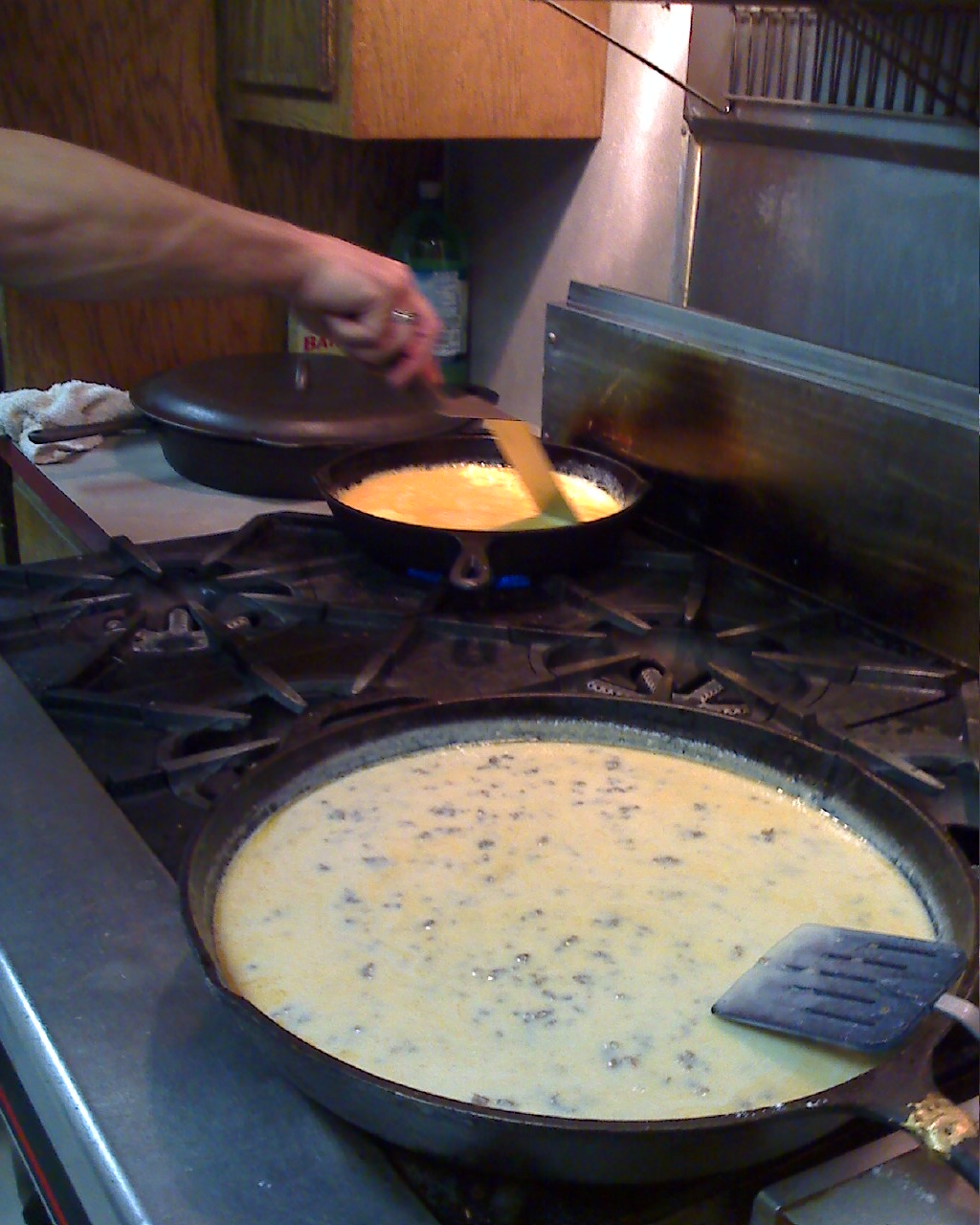 a set is frying food on the stove